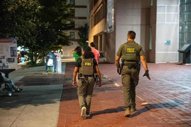 Image shows an FBI agents and a US Border Patrol agents patrolling in Washington DC