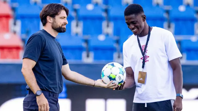 Rangers head coach Russell Martin and Nasser Djiga