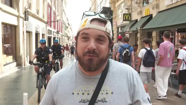 Benjamin in busy street in Bordeaux
