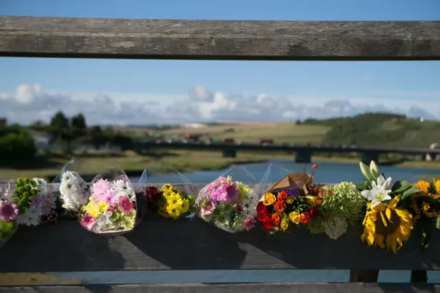 Flowers left on the toll bridge at Shoreham