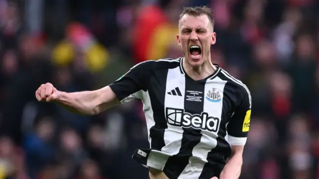Dan Burn celebrates