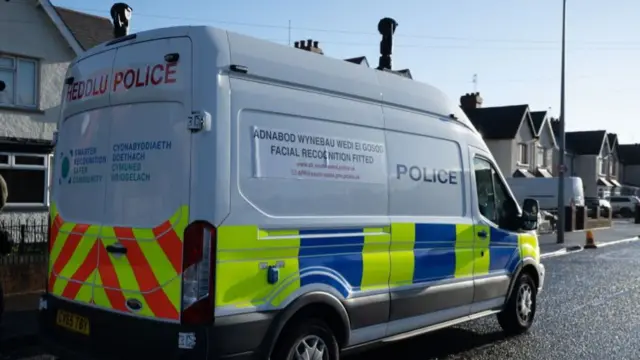 A South Wales Police live facial recognition van with signs identifying it on the side and cameras on the roof