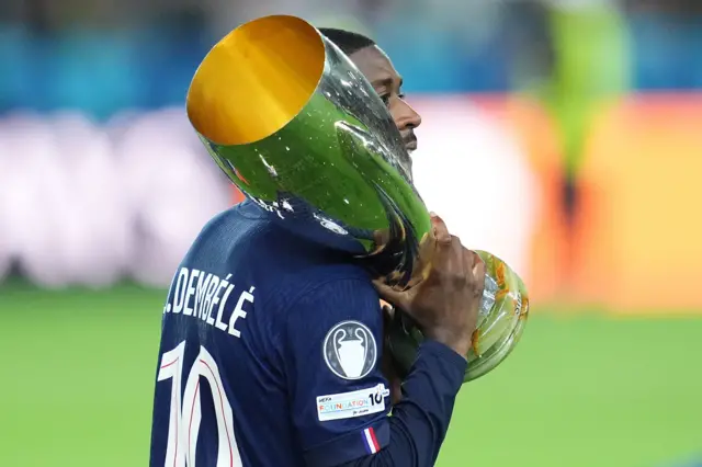 Dembele holds the Super Cup trophy