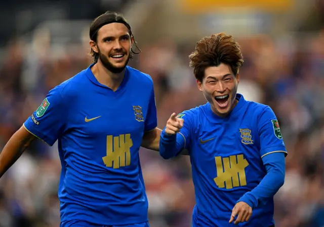 Kyogo Furuhashi of Birmingham City celebrates scoring his team's first goal with teammate Willum Willumsson