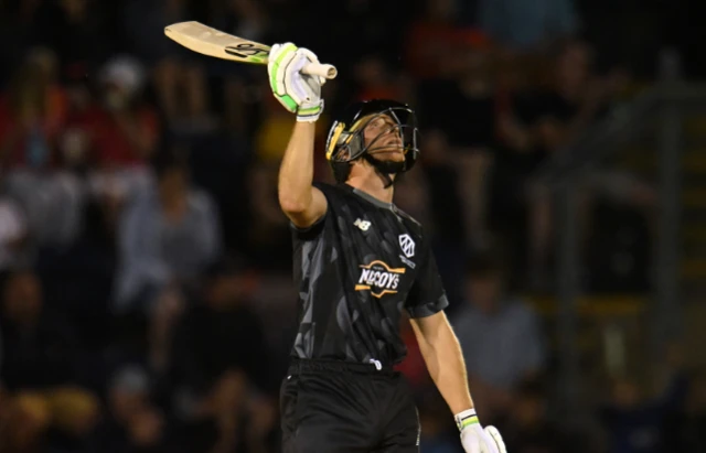 Jos Buttler gestures to the sky