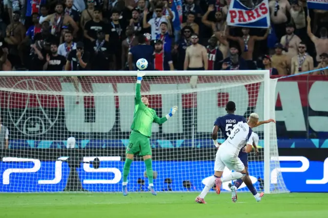 Chevalier palms Richarlison's shot high into the air
