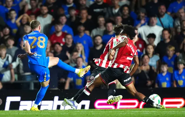 Birmingham City's Jay Stansfield (left) scores