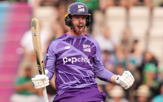 Northern Superchargers' Graham Clark celebrates hitting a six to win the match