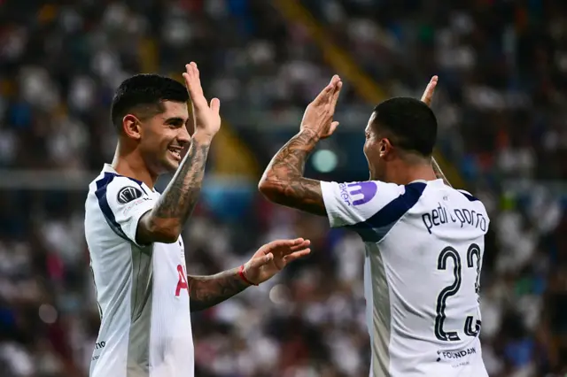 Romero and Porro celebrate a defensive action