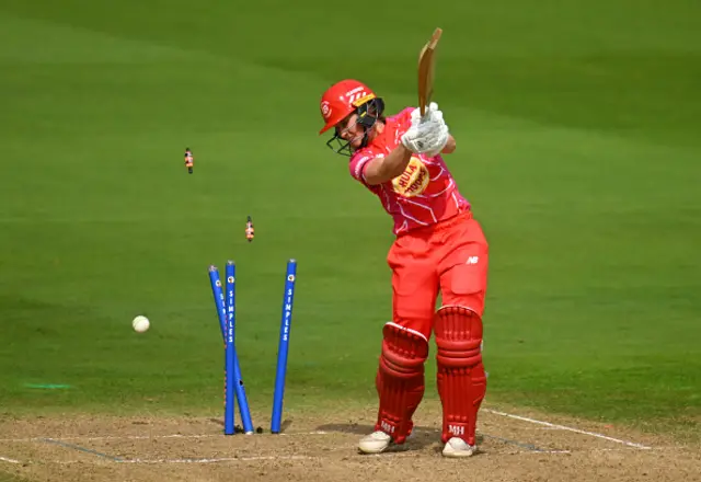Emily Windsor of Welsh Fire is bowled by Lauren Filer