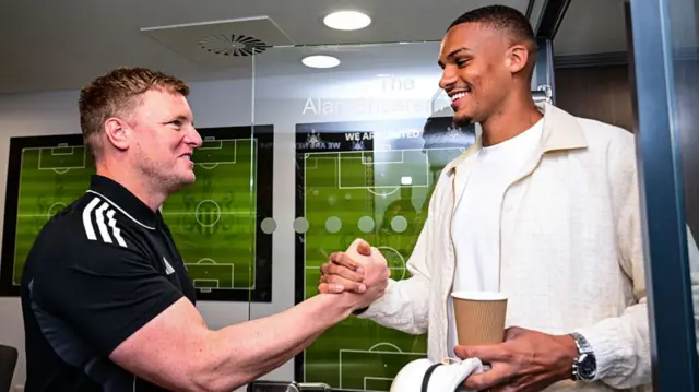 Eddie Howe with Malick Thiaw after signing