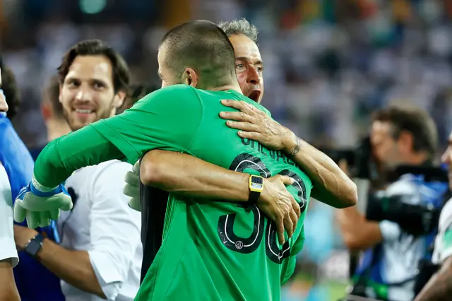 Chevalier and Enrique embrace at full time