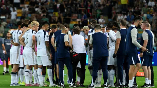 Frank chats to his players before the penalty shootout