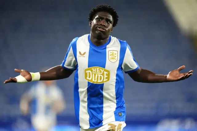 Huddersfield Town's Cameron Ashia celebrates