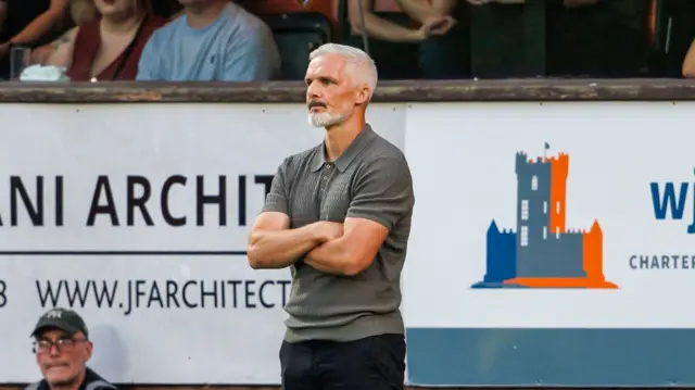 Jim Goodwin seems frustrated on the touchline