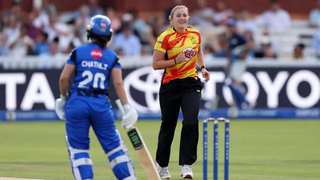 Cassidy McCarthy smiles after taking the wicket of Kira Chathli.