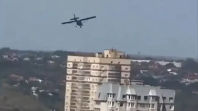 A screengrab from the video shows the drone prior to impact with the apartment building