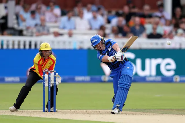 Grace Harris of London Spirit bats as wicket keeper Nat Wraith of Trent Rockets looks on