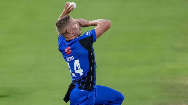 Luke Wood mid-stride while bowling v Trent Rockets.