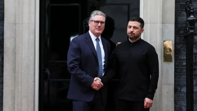 British Prime Minister Keir Starmer welcomes Ukrainian President Volodymyr Zelenskiy to 10 Downing Street, in London, Britain, August 14, 2025.