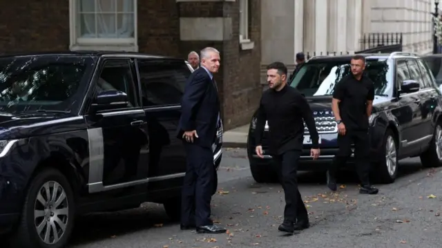 Ukrainian President Volodymyr Zelenskiy arrives to meet British Prime Minister Keir Starmer at 10 Downing Street, in London, Britain, August 14, 2025.