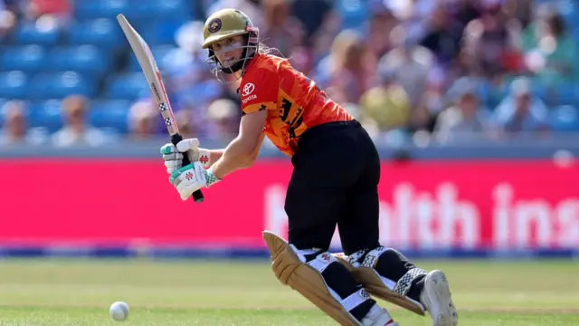 Emma Lamb runs after batting