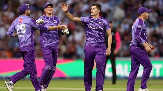 Northern Superchargers celebrate taking the wicket of Joe Clarke.