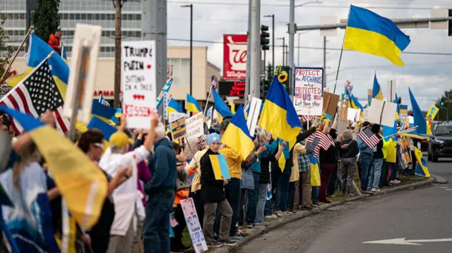 People rally in support of Ukraine in ahead of Donald Trump and Vladimir Putin's summit in Anchorage, Alaska on 14 August 2025.