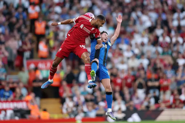Liverpool and Bournemouth players challenge for a dual