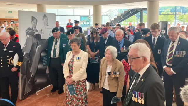 People at the ceremony in Antrim, many of whom are wearing military medals