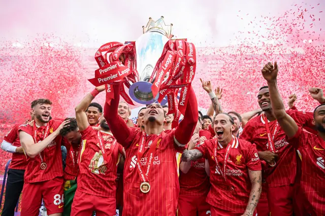Liverpool lift the Premier League trophy