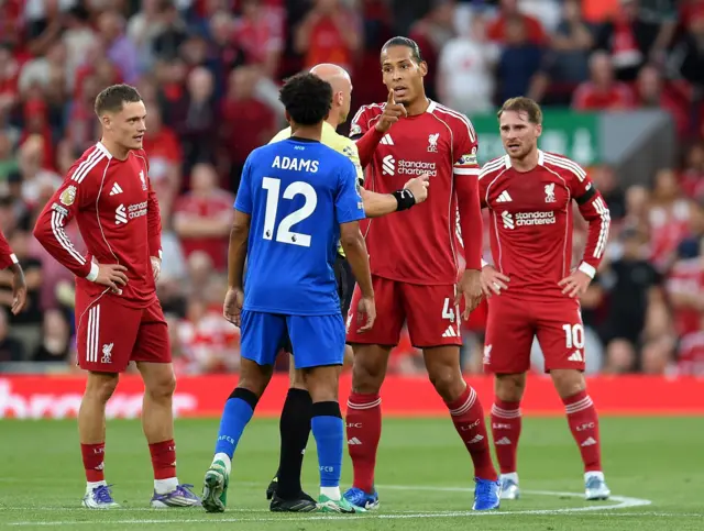 Van Dijk protests to Anthony Taylor