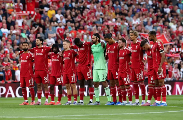 Liverpool players stand for a minute's silence in memory of former teammate Jota