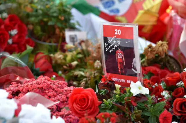 A wreath lays outside Anfield with the image of Jota