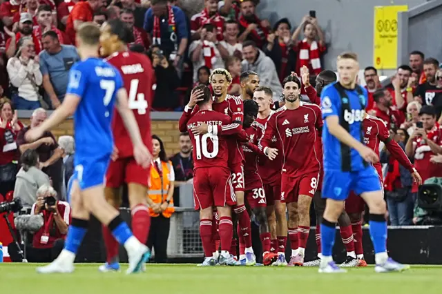 Ekitike and his teammates celebrate as Bournemouth trudge back to kick off