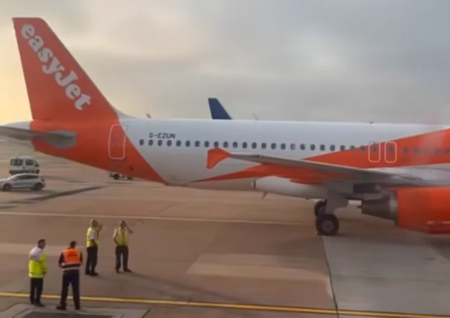 An EasyJet plane with a damaged wing tip