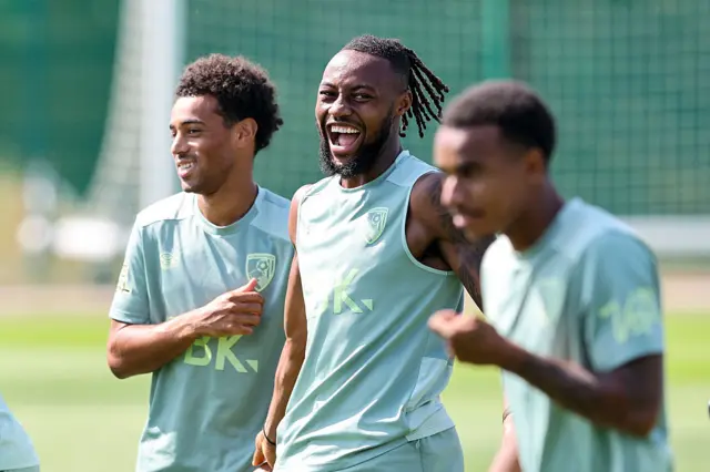 Bournemouth players share a joke in training
