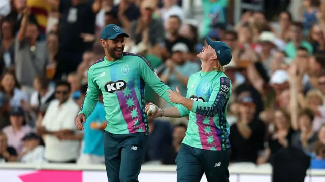 ordan Cox of Oval Invincibles celebrates with teammate Donovan Ferreira