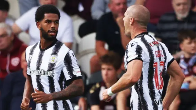 St Mirren players celebrate scoring against Hearts