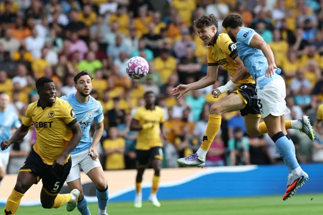 Jorgen Strand Larsen vies with Manchester City's Portuguese defender Ruben Dias