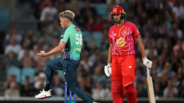 Sam Curran dancing in front of Chris Green