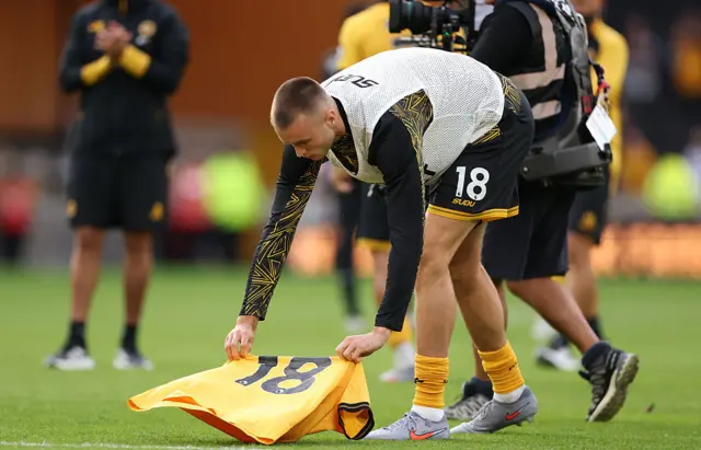 A Wolves shirt bearing Diogo Jota's name and the number 18 was laid on the Molineux turf
