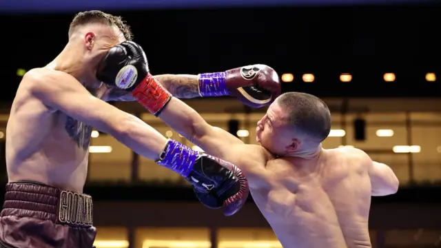 Nick Ball punches Sam Goodman
