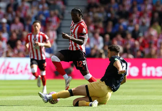 Eliezer Mayenda of Sunderland is challenged by Max Kilman