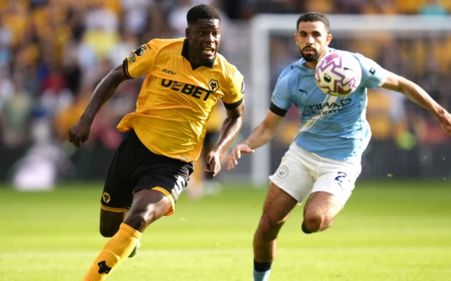 Wolverhampton Wanderers' Marshall Munetsi (left) and Manchester City's Rayan Ait-Nouri battle for the ball