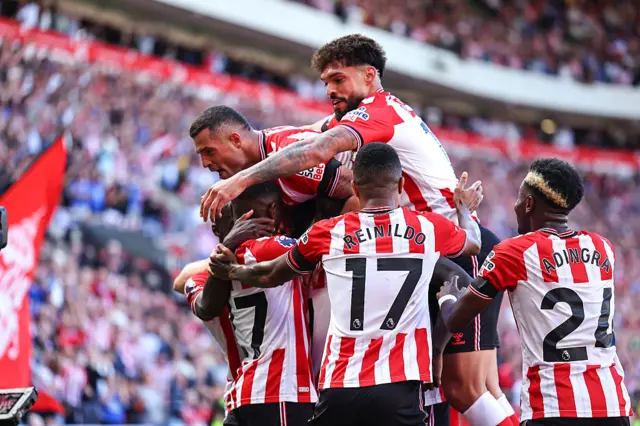 Sunderland players celebrate a goal against West Ham
