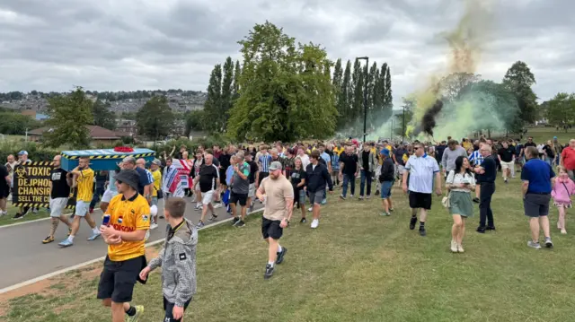 Sheffield Wednesday fans protest in Hillsborough Park before their game with Stoke