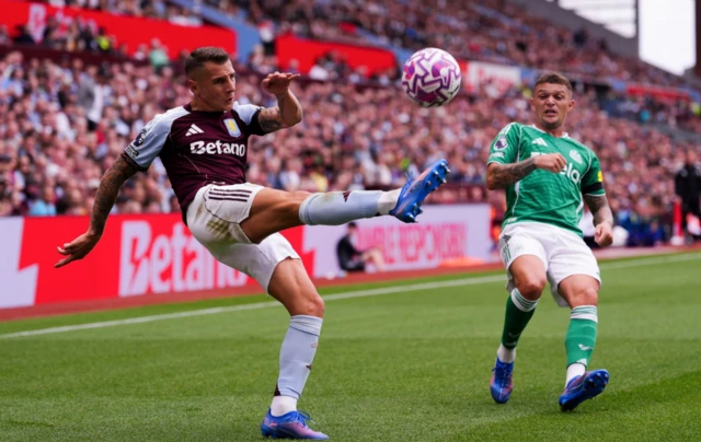 Aston Villa's Lucas Digne clears from Newcastle United's Kieran Trippier