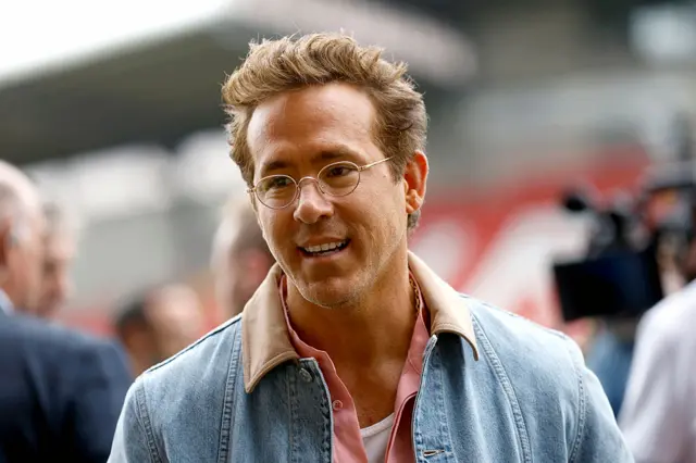Wrexham AFC co-owner Ryan Reynolds pictured on the pitch