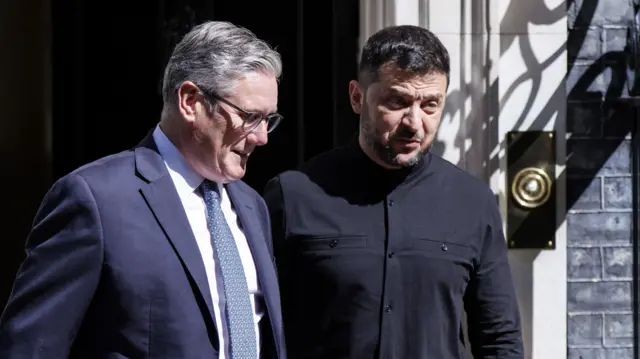 Keir Starmer walks out of 10 Downing Street door with Volodymyr Zelensky while pair have a conversation